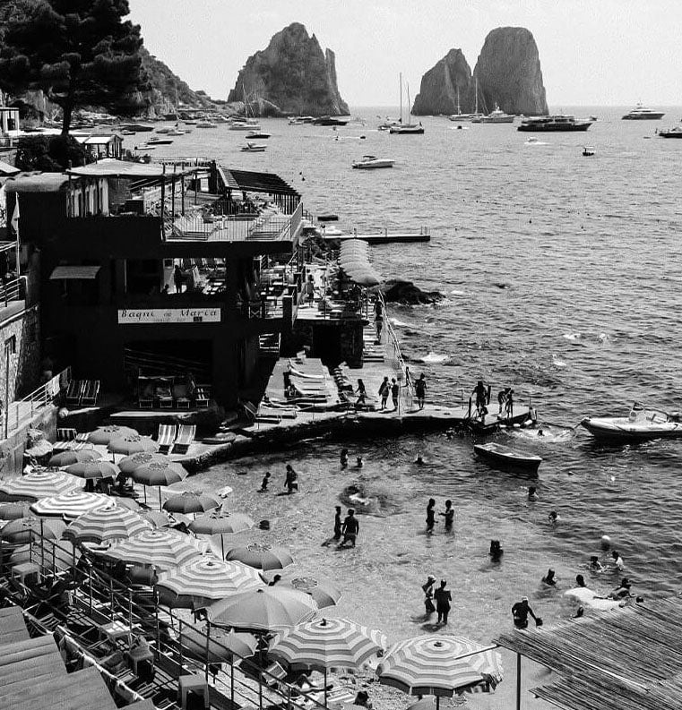 Black and white photo of swimmers at Marina Piccola in Capri, Italy. Black & White art print collection by Outside In. Photo of beautiful Lush tropical plants. Botanic art print collection by Outside In.