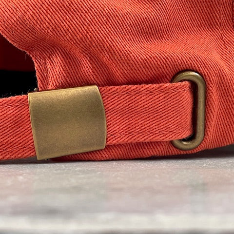 Brass buckle of the sun cap