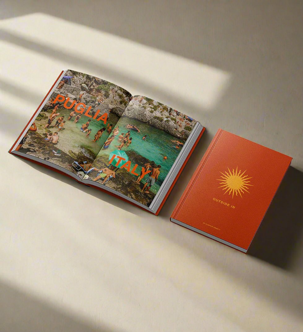 Sunlight hitting open book featuring beach photo taken in Puglia, Italy