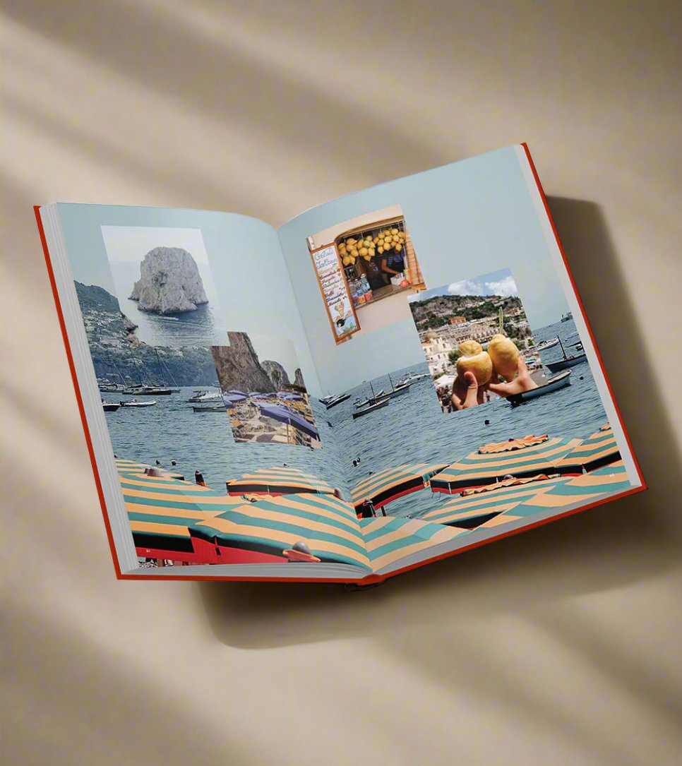 Open book on an angle featuring photos of Capri and Postiano, Italy