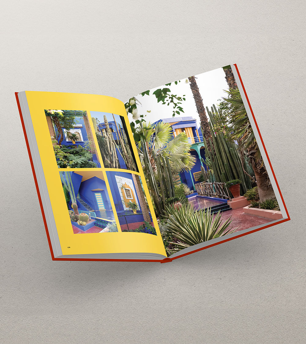 Open coffee table book featuring images of Marrakech