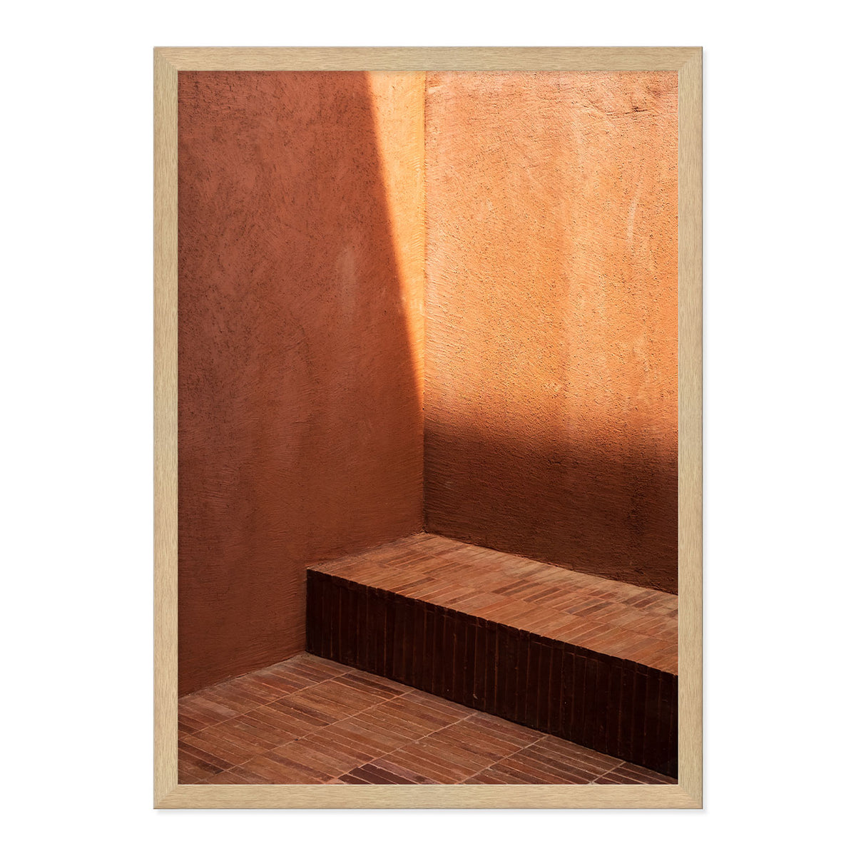 Wooden bench against a textured orange wall with a wooden frame.